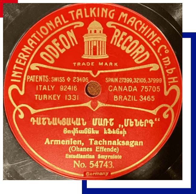 A red and yellow record with the words " international talking machine co. H." on it
